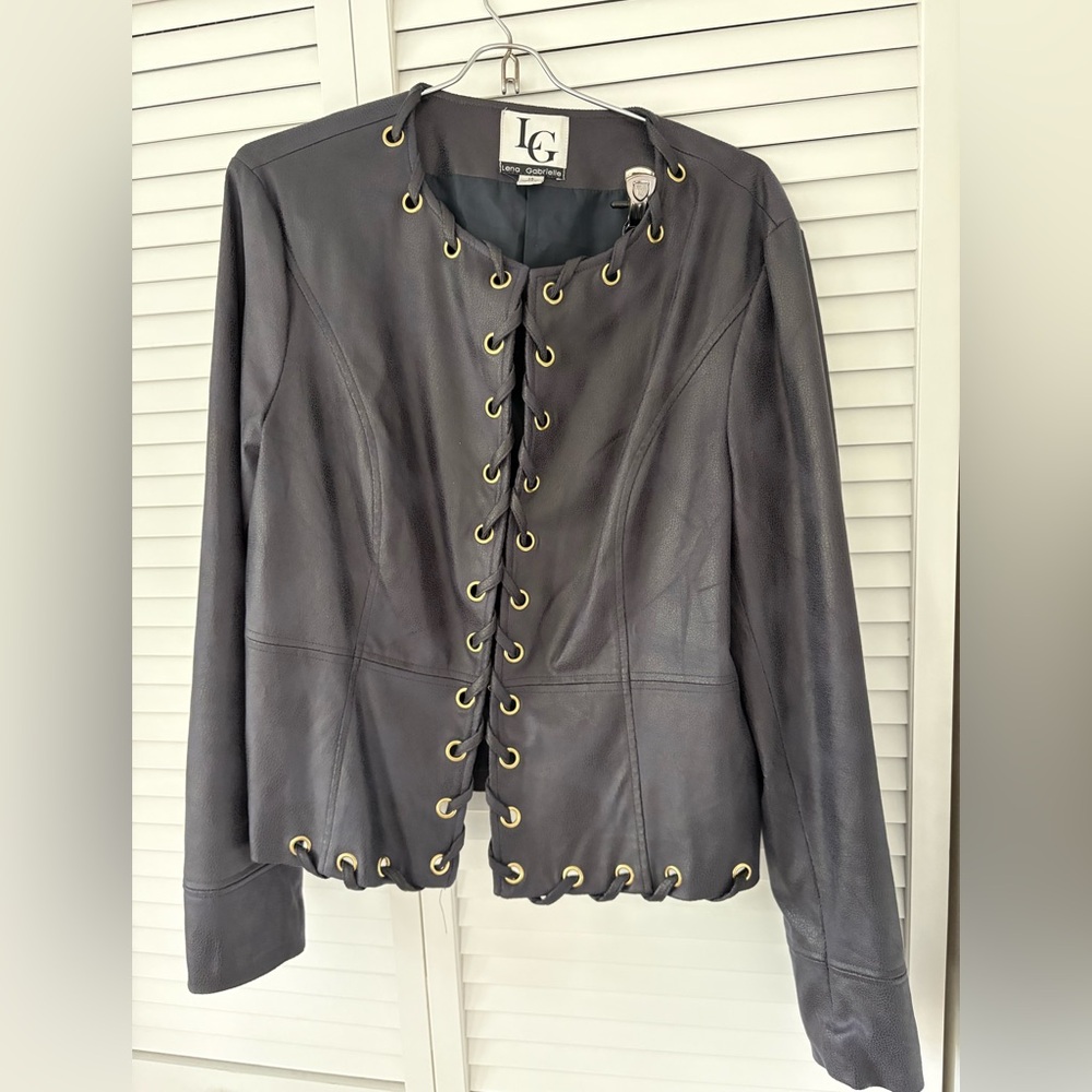 Vintage faux leather jacket in charcoal gray with gold eyelet details.